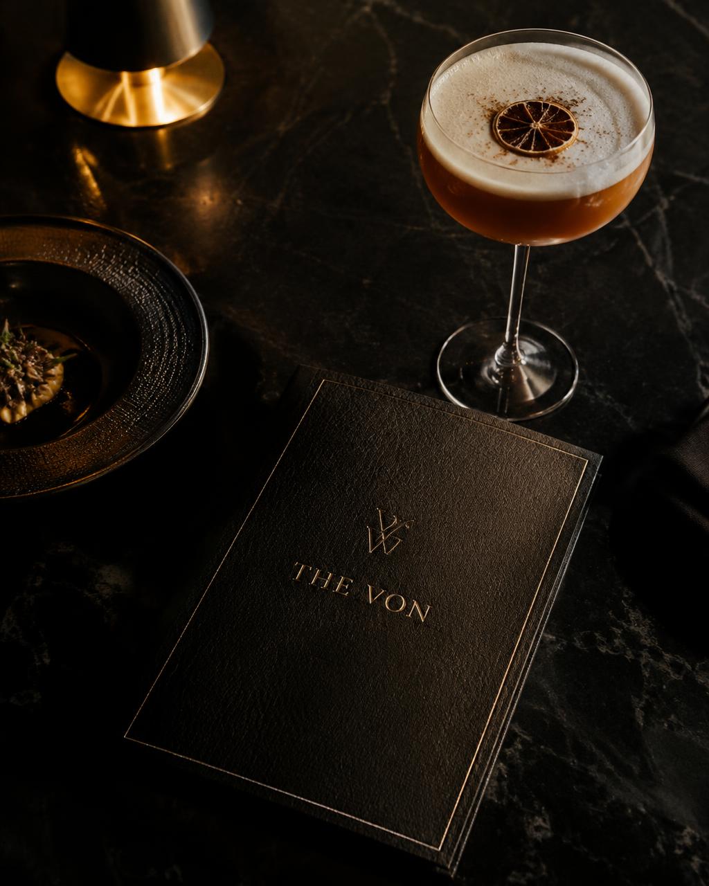 Moody, low-lit restaurant interior at night